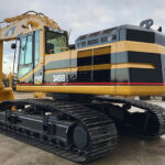 CAT 345BL excavator with durable bucket and crane features, priced to fit your needs.